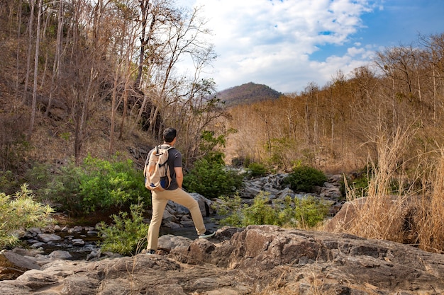 Free photo hiker taking a rest